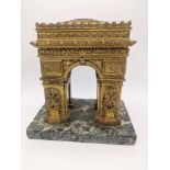 An ormolu bronze model of the Arc de Triomph, mounted on a marble base, circa 1900, H.21cm W.19cm