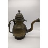 A Tibetan brass teapot and a Yak butter container, Tibet, China, H.25cm