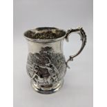 A Victoria silver mug,embossed scenes of hunters, hallmarked London, 1871, maker Robert Harper,