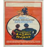 A Laurel and Hardy framed advertising poster, H.55cm W.34cm