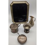 A collection of silver items to include an Italian photo frame, H.24cm, a Goldsmiths mustard pot