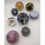 A collection of glass paperweights (8)