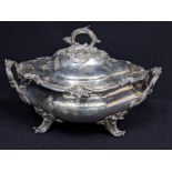 A large early Victorian silver soup tureen, twin handled, raised on 4 swept legs, interior silver