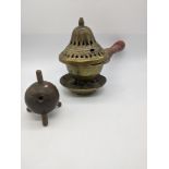 A late 19th/early 20th century Indian cast brass oil lamp with oil container,Kerala,South India, H.