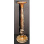 A late 19th century mahogany carved torchere, H.119cm
