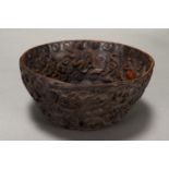 A Chinese carved hardwood bowl, D.17cm