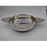 A large 18th century silver porringer, possibly French, marks and engraving, 290g, W.26.5cm