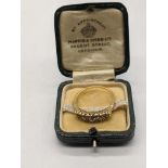 An 18ct yellow gold and five diamond ring, approx 0.4cts combined, 2g, size P