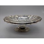 An 18th century German provincial silver dish, marks and engraving, 113g, H.5.5cm L.15cm