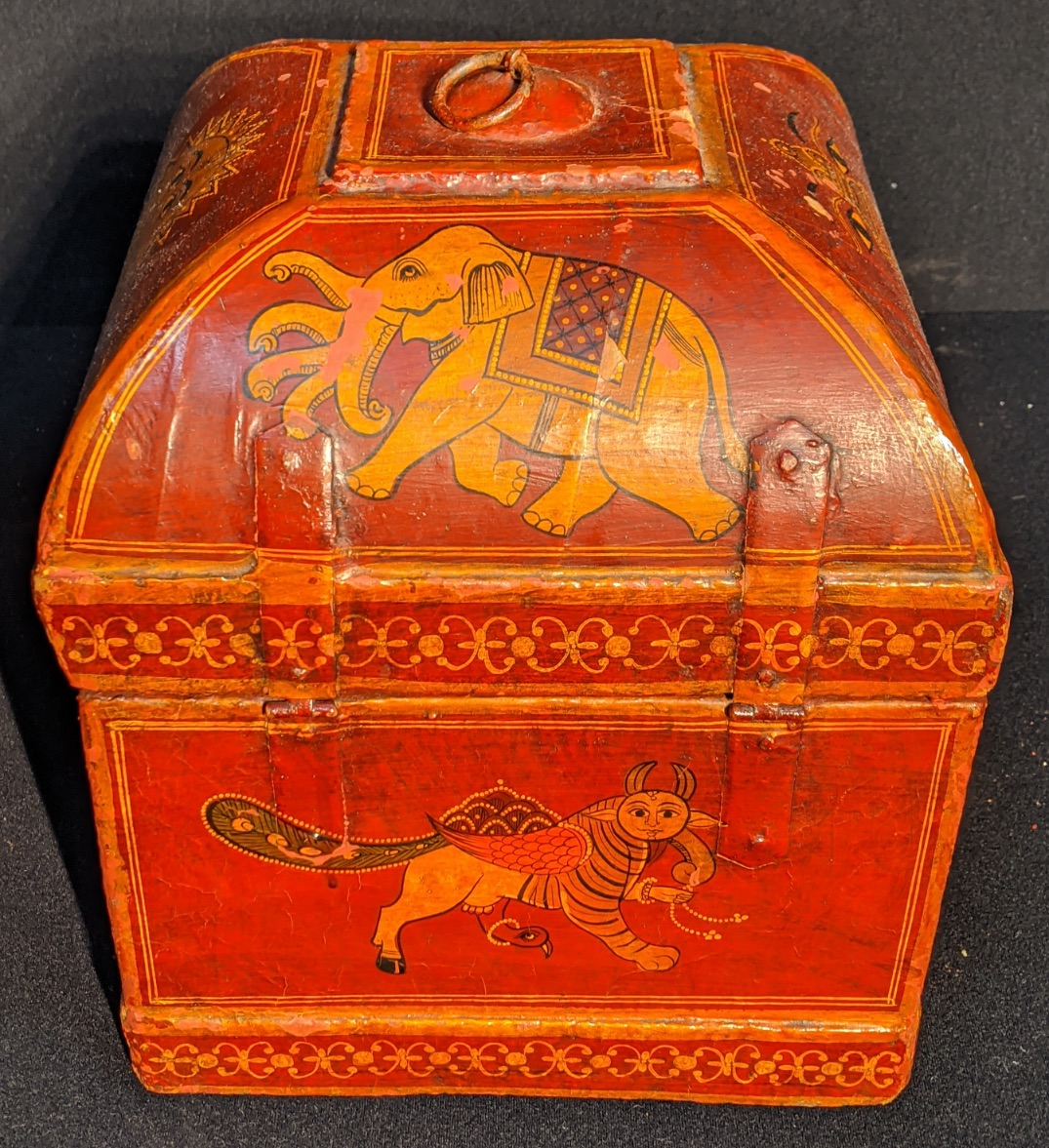 An Indian papier mache turban box, red ground depicting gods and animals, H.27cm W.25cm D.25cm - Image 4 of 4