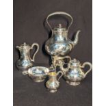 A Victorian 5 piece silver tea set comprising of a kettle with burner stand, a teapot, water jug,