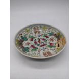 A Chinese late Qing Dynasty famille rose dish, character mark to base, D.11cm