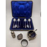 A set of silver apostle spoons and matching tongs, hallmarked Sheffield, together with a Victorian