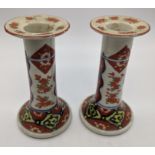 A pair of 19th century Chinese export Imari porcelain candlesticks, H.13cm