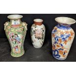 Two Japanese vases and one Chinese famille rose vase
