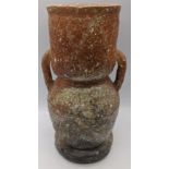A Japanese Shigaraki glazed pottery vase, twin handled, signed to base, H.24cm