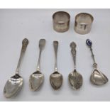 A Walter and John Barnard silver spoon, together with 4 other spoons and a pair of napkin rings,