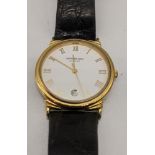 A Raymond Weil gents gold plated wristwatch, date aperture, black leather strap