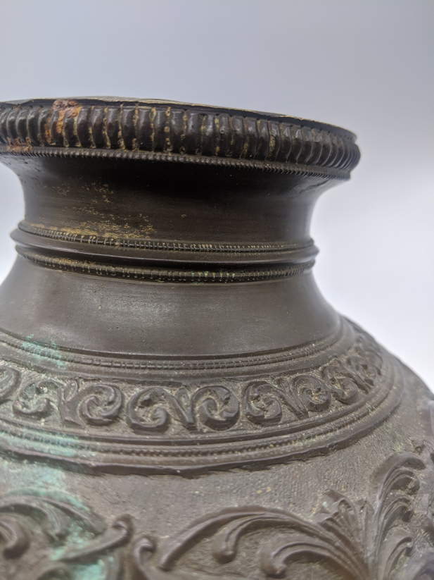 A 19th century Indian bronze ablutions or lota vessel, scrolling decoration depicting animals, - Image 4 of 7