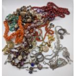 A collection of costume jewellery, cufflinks, tie pins etc.