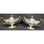 A pair of George III silver sauce tureens, twin handled with acorn finials, hallmarked London, 1800,