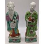 Two 19th century Chinese porcelain immortal figures, H.21cm