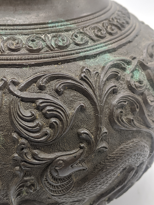 A 19th century Indian bronze ablutions or lota vessel, scrolling decoration depicting animals, - Image 3 of 7