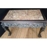 A late 19th century Chinese carved hardwood table, marble top, pierced frieze with figural scenes,