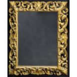 A large giltwood mirror with bevelled plate glass, early 20th century, 114cm x 92cm