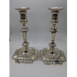 A pair of Georgian style early 20th century silver candlesticks, hallmarked London, 1905, maker