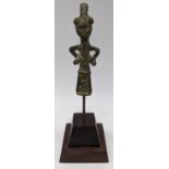 A West African tribal brass figure with infant on her back, probably Senufo People, H.23cm