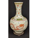 A Chinese early 20th century baluster vase, the body decorated with dragons chasing the flaming