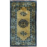 A blue and yellow prayer mat, 123cm x 61cm