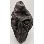 An early, proto-surrealist / grotesque style wooden head, H.18.5cm, W.9cm