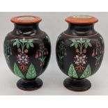 A pair of Victorian porcelain black ground vases floral decor with red banding
