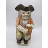 A 19th century Staffordshire pottery toby jug, H.24cm