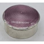 An early 20th century purple guilloche enamel silver box, hallmarked Birmingham, 33g, D.6cm