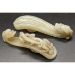 Two Chinese jade carved belt hooks, L.8cm