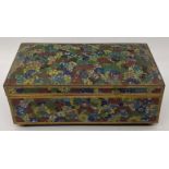 A Chinese enamelled jewellery box, raised on four bun feet, L.21.5cm