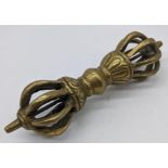 A 19th century Tibetan brass vajra, L.12cm