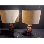 A pair of purple resin lamps
