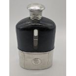 An Aspreys Victorian silver and glass hip flask, with black leather outer, engine turned base and