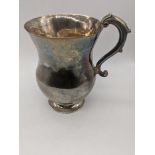 An early silver tankard, bearing faint letter mark to base and to upper join of handle to body,