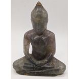 A 19th century or earlier seated Chinese white-jade Buddha, H.13cm, W.9.5cm,