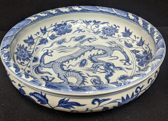 A late 19th/early 20th century Chinese porcelain bowl, H.9.5cm, D.39cm,