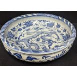 A late 19th/early 20th century Chinese porcelain bowl, H.9.5cm, D.39cm,