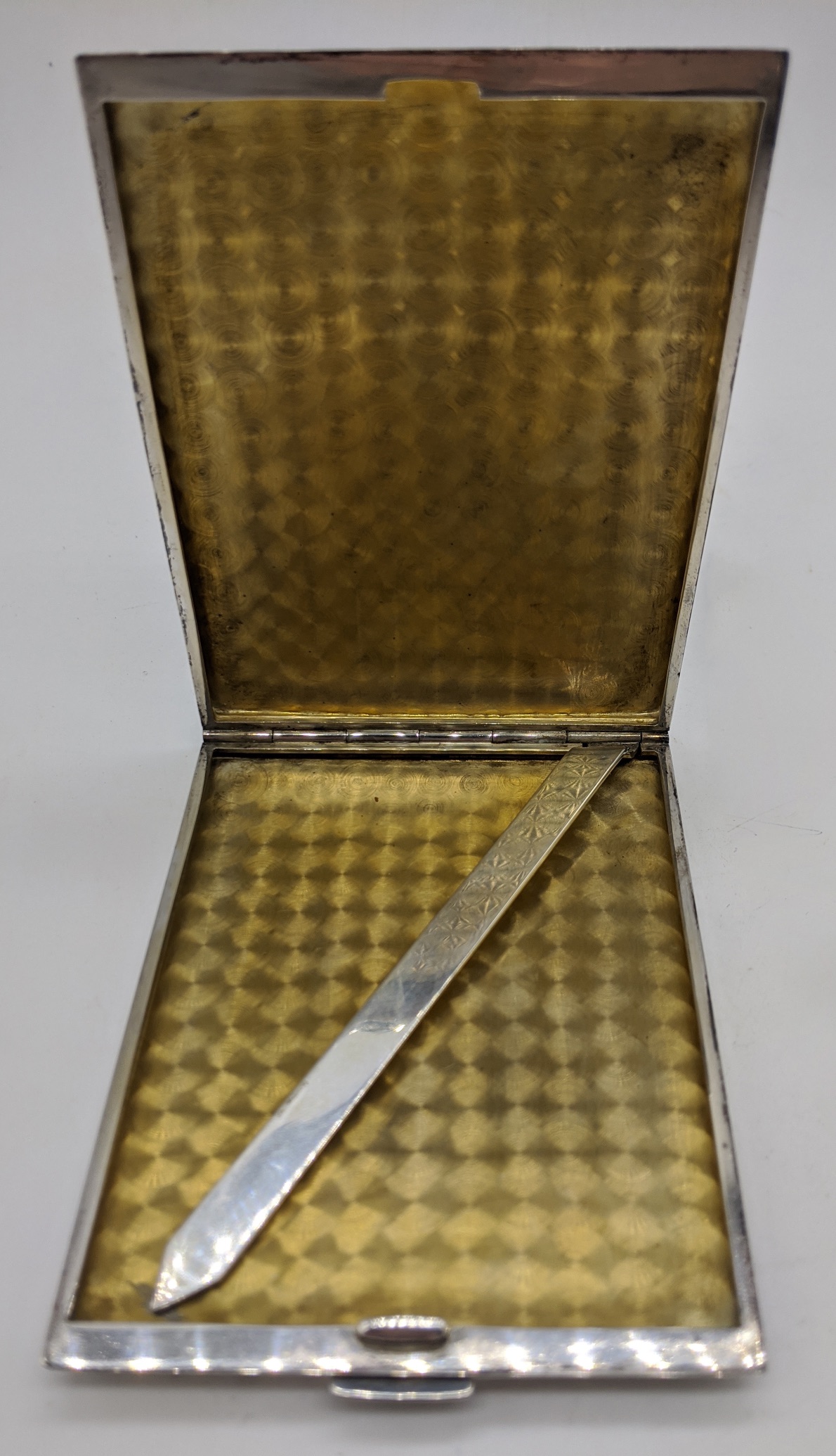 A Cartier silver cigarette case, gilt interior, 9.5cm x 7cm together with an early 20th century - Image 6 of 6