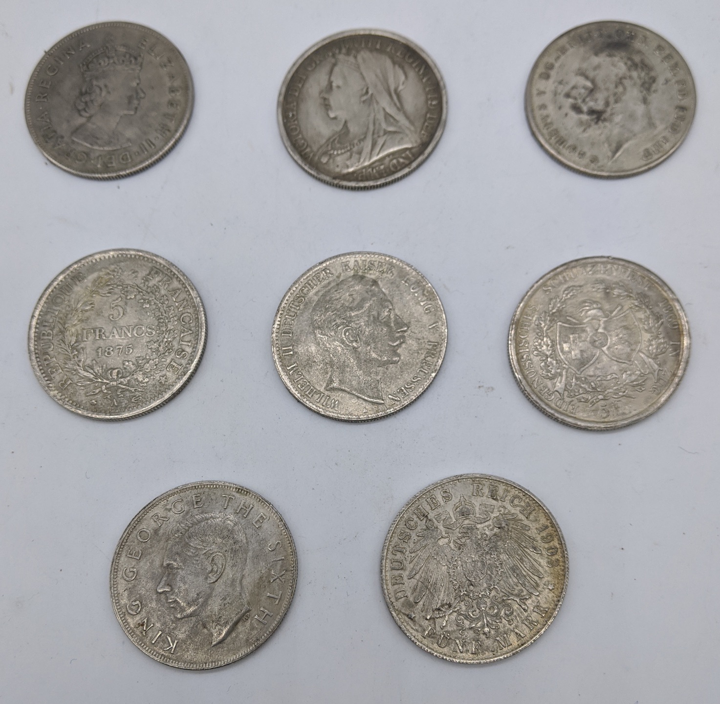 A collection of 8 silver coins: 1898 Queen Victoria Crown, 1869 Switzerland 5 Francs, 1875 French - Image 2 of 2