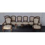 A set of 8 dining chairs, two carvers.
