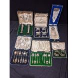 A collection of assorted silverware to include two cased vases, hallmarked Birmingham, 1911,